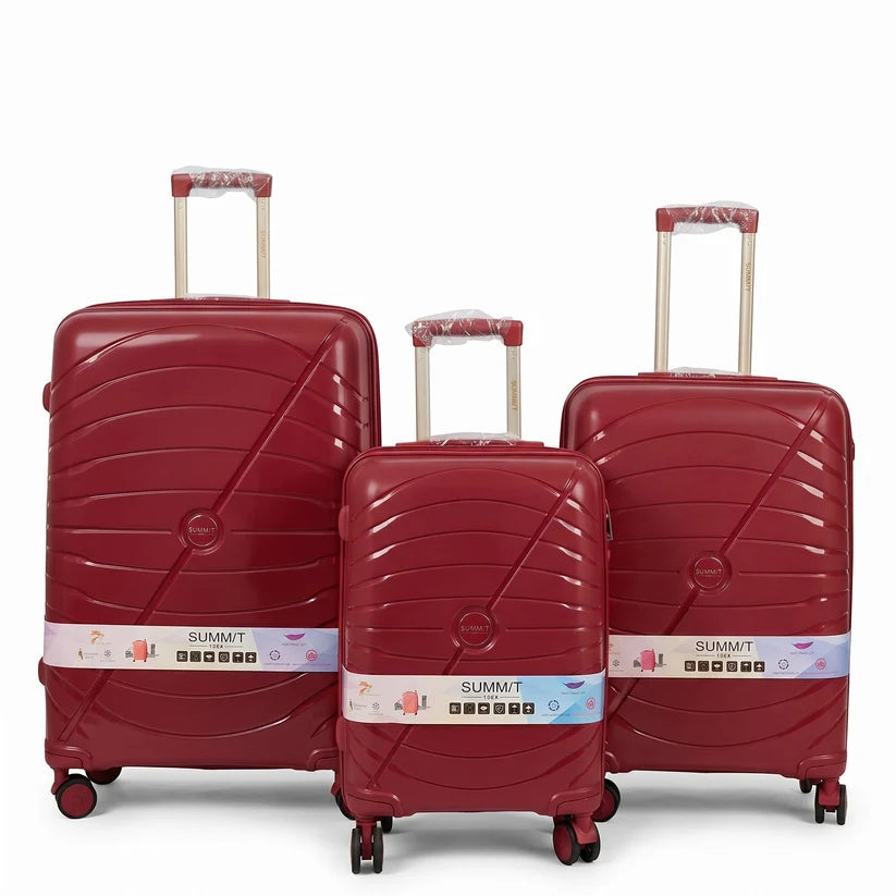 Red Summit travel luggage with smooth spinner wheels and lightweight design for easy carrying
